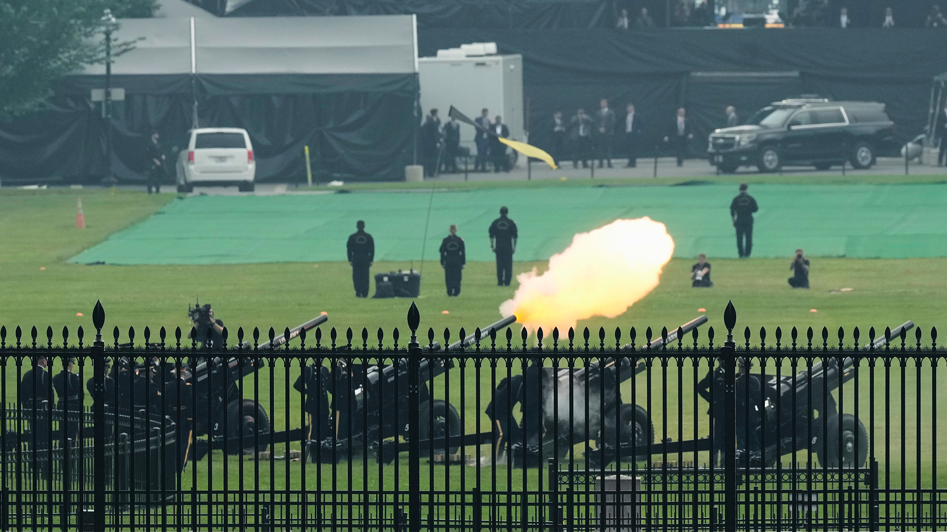 Members of the military fire cannons as part of a 21-gun salute during an event to honor the Army's 250th anniversary on June 14, 2025, in Washington.